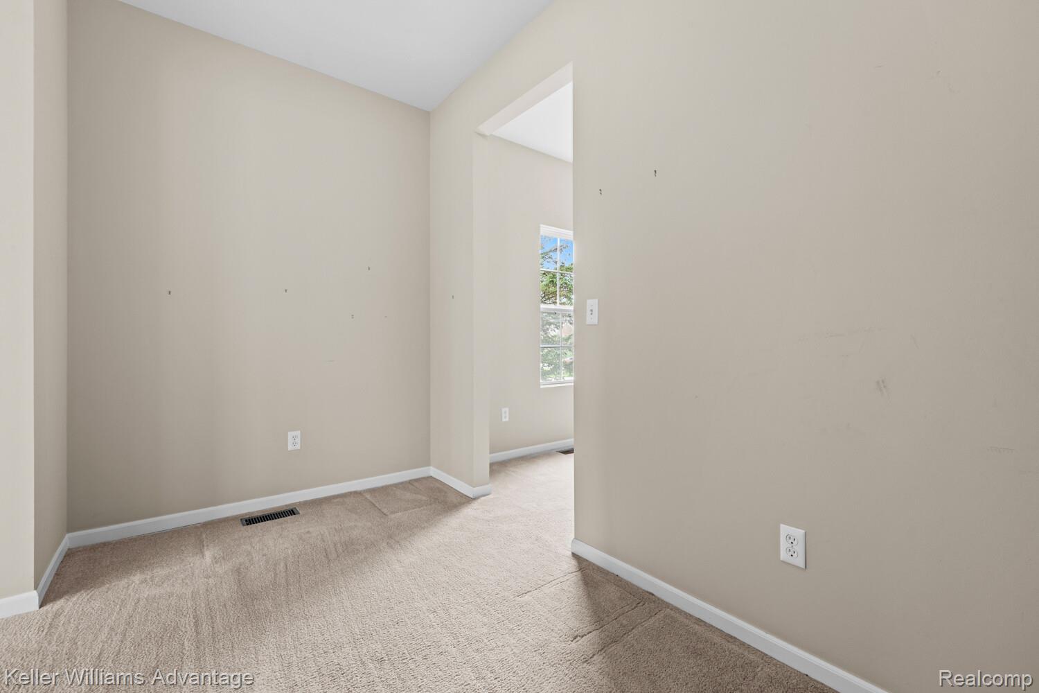 4100 Norwich Court Rochester, MI 48306 - Photo 22 of 72 Unfurnished room featuring light colored carpet and baseboards