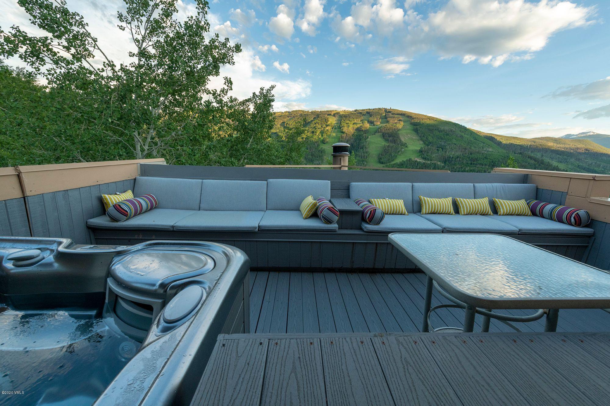 770 Potato Patch Drive, Unit 15 Vail, CO 81657 - Photo 16 of 23 a terrace with outdoor seating and trees