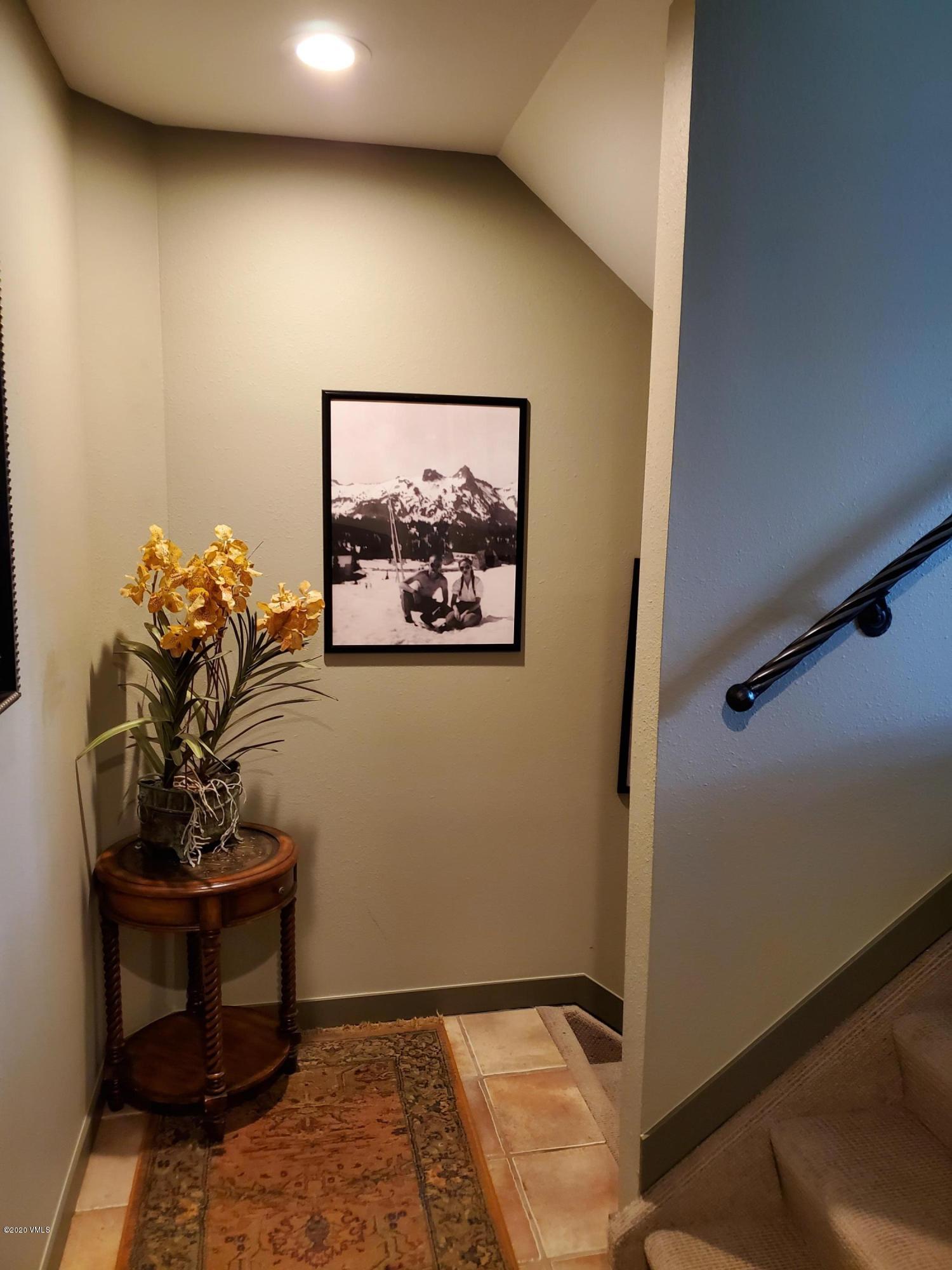 770 Potato Patch Drive, Unit 15 Vail, CO 81657 - Photo 18 of 23 a room with furniture and window