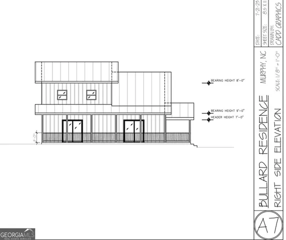 a black and white photo of a living room