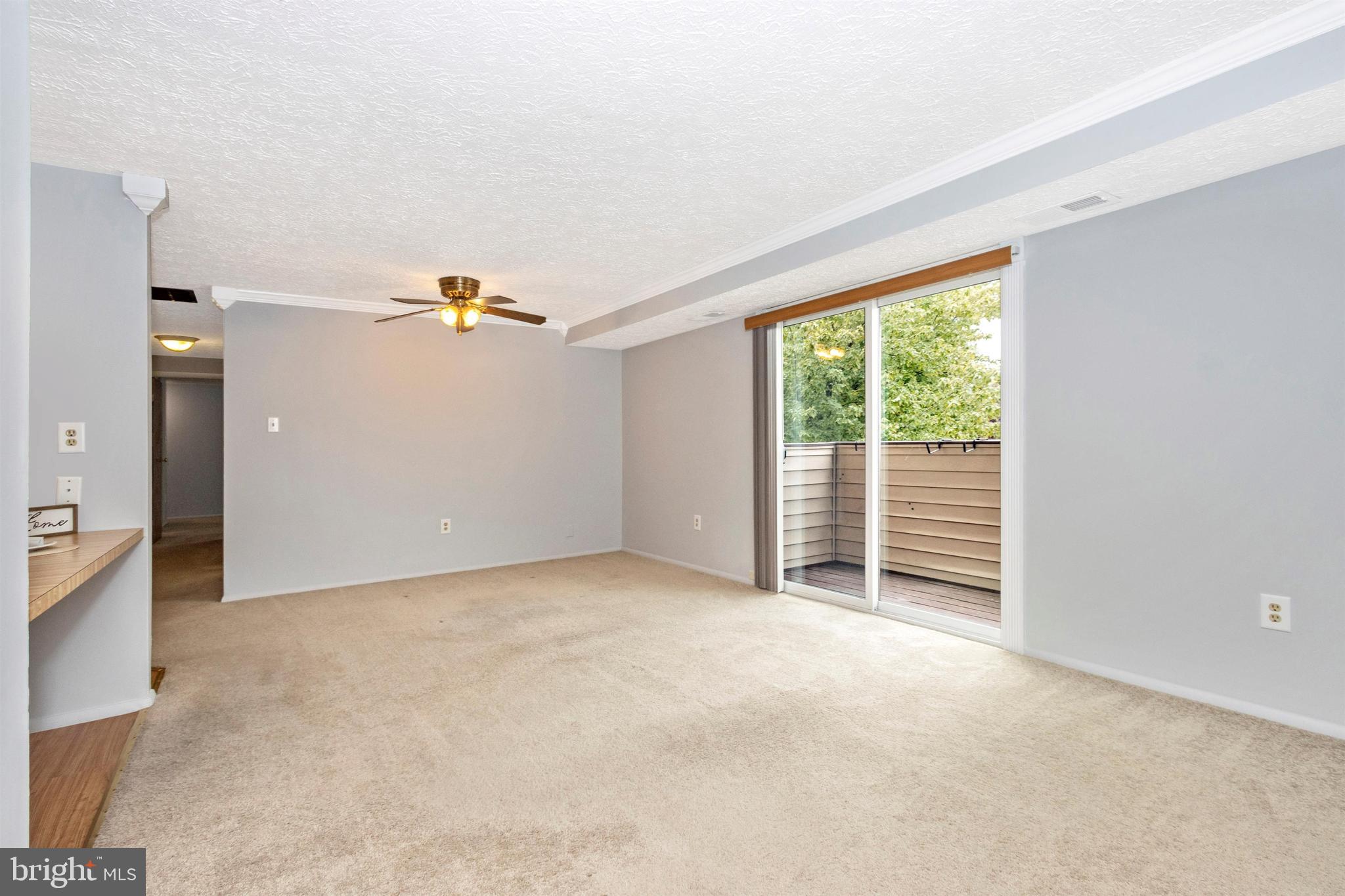 501 H Heather Ridge Drive, Unit 8H Frederick, MD 21702 - Photo 3 of 28 Living Rm/Dining Rm Combo w/ Slider to Balcony
