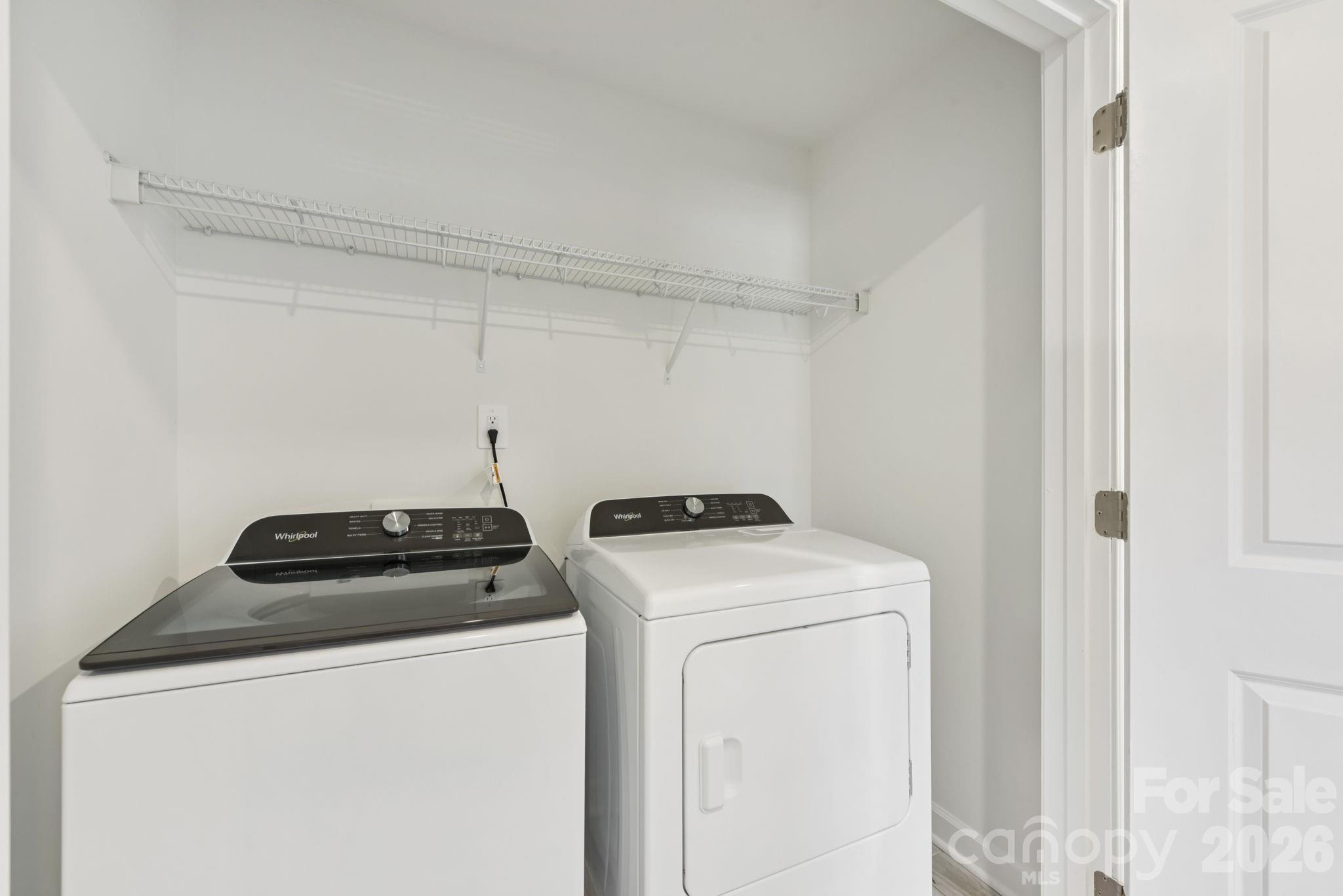 433 Markridge Loop Fort Mill, SC 29708 - Photo 5 of 10 a view of storage and utility room with washer and dryer