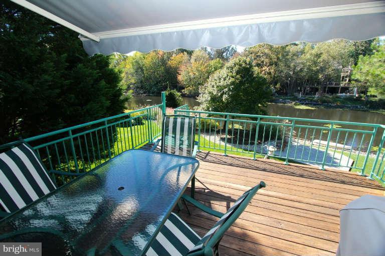 1464 Waterfront Road Reston, VA 20194 - Photo 11 of 30 Deck with awning and lakeviews