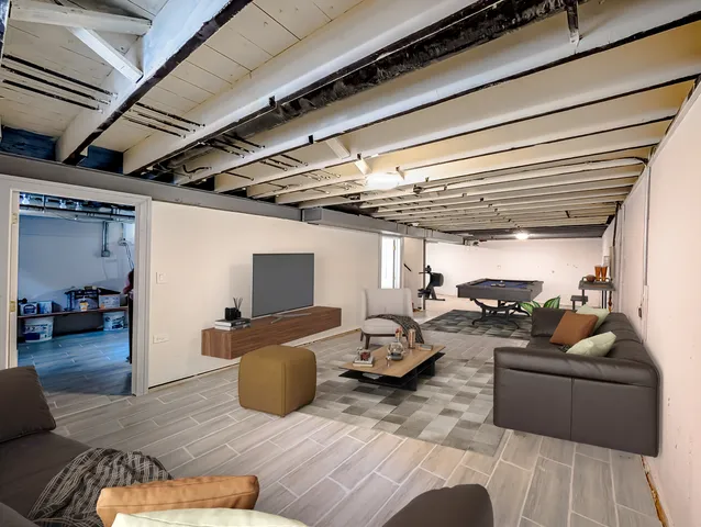 a living room with furniture and a view of couch