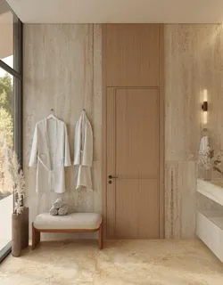 a backyard of a house with barbeque oven and tree