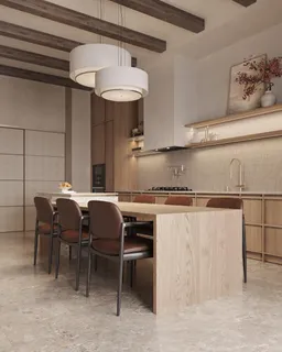 a kitchen with a table chairs and a dining table