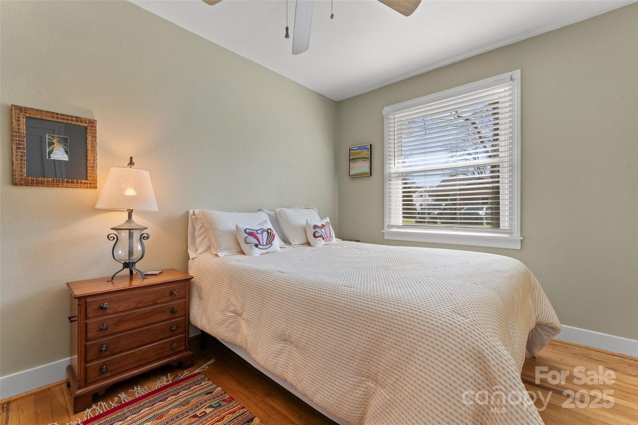 580 Maple Street Brevard, NC 28712 - Photo 22 of 28 a bedroom with a bed and a window