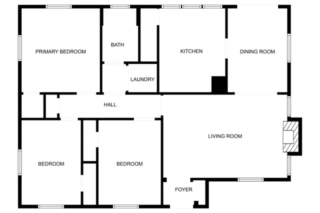 a living room with lots of furniture and clutter