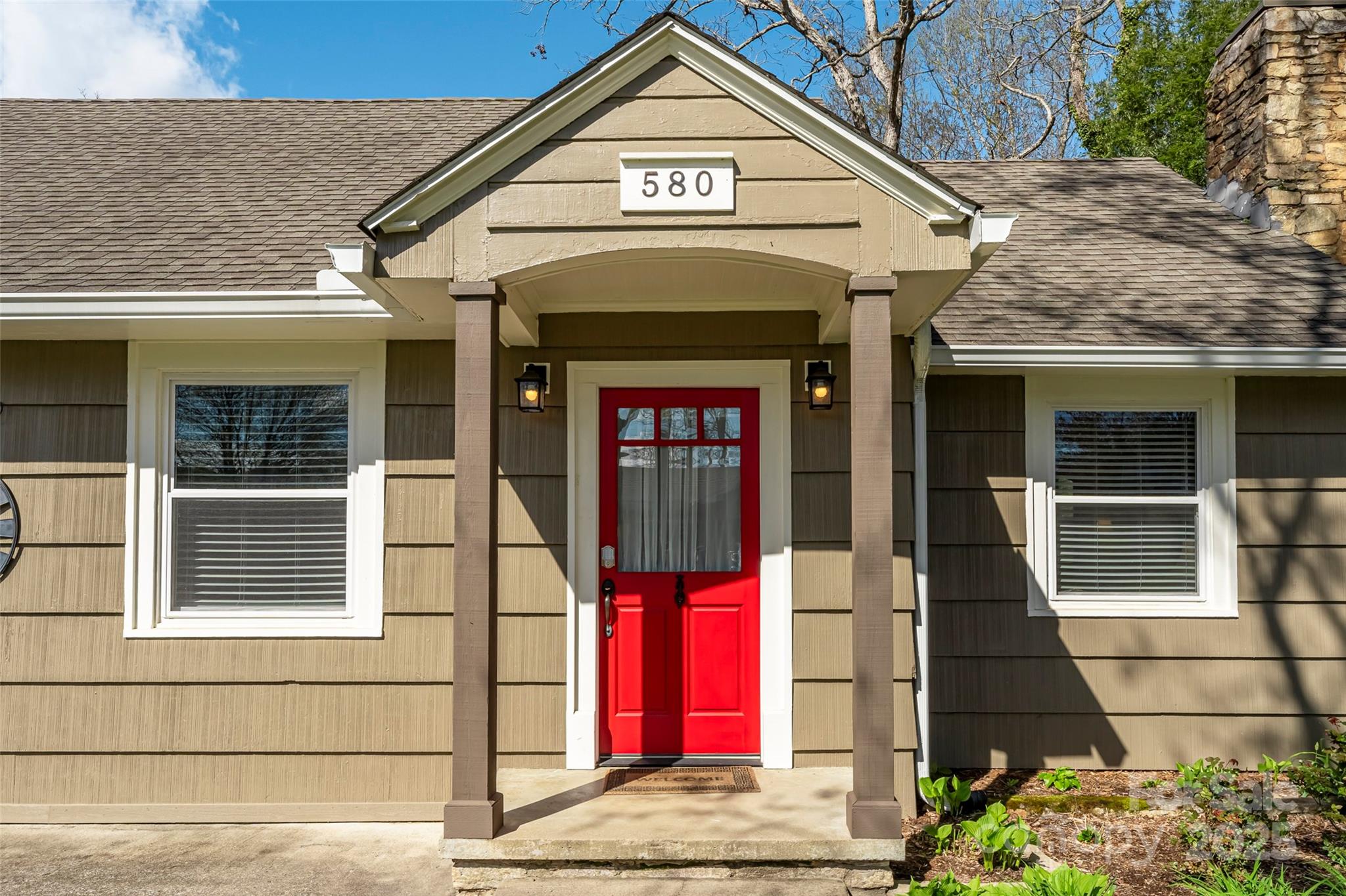 580 Maple Street Brevard, NC 28712 - Photo 8 of 28 a view of a building with door