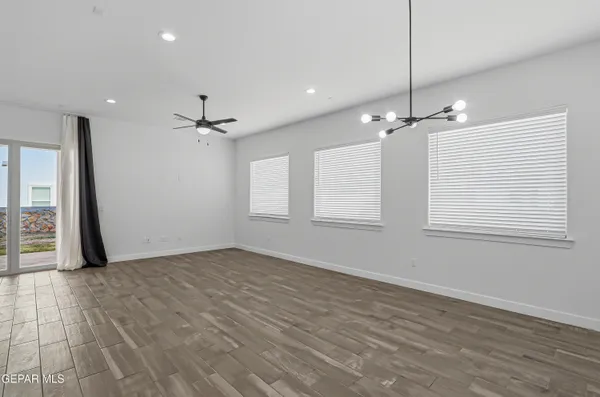 a bathroom with a double vanity sink a mirror and a bathtub