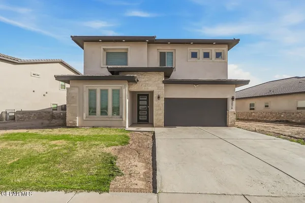 a view of a hallway with closet and stairs