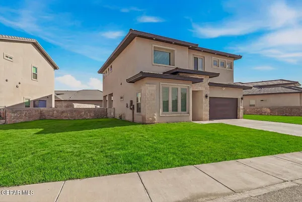 a view of bathroom with a toilet a sink and a mirror
