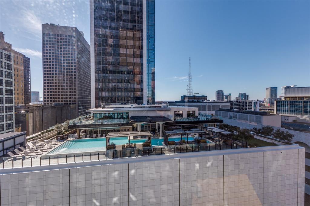 1505 Elm Street, Unit 1004 Dallas, TX 75201 - Photo 28 of 32 a city view with tall buildings