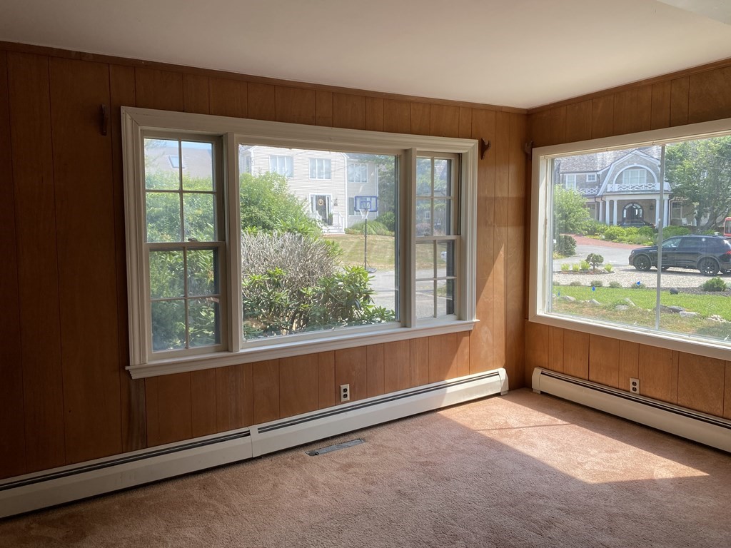 6 Eagle Nest Road Scituate, MA 02066 - Photo 1 of 1 an empty room with an outdoor view and a window