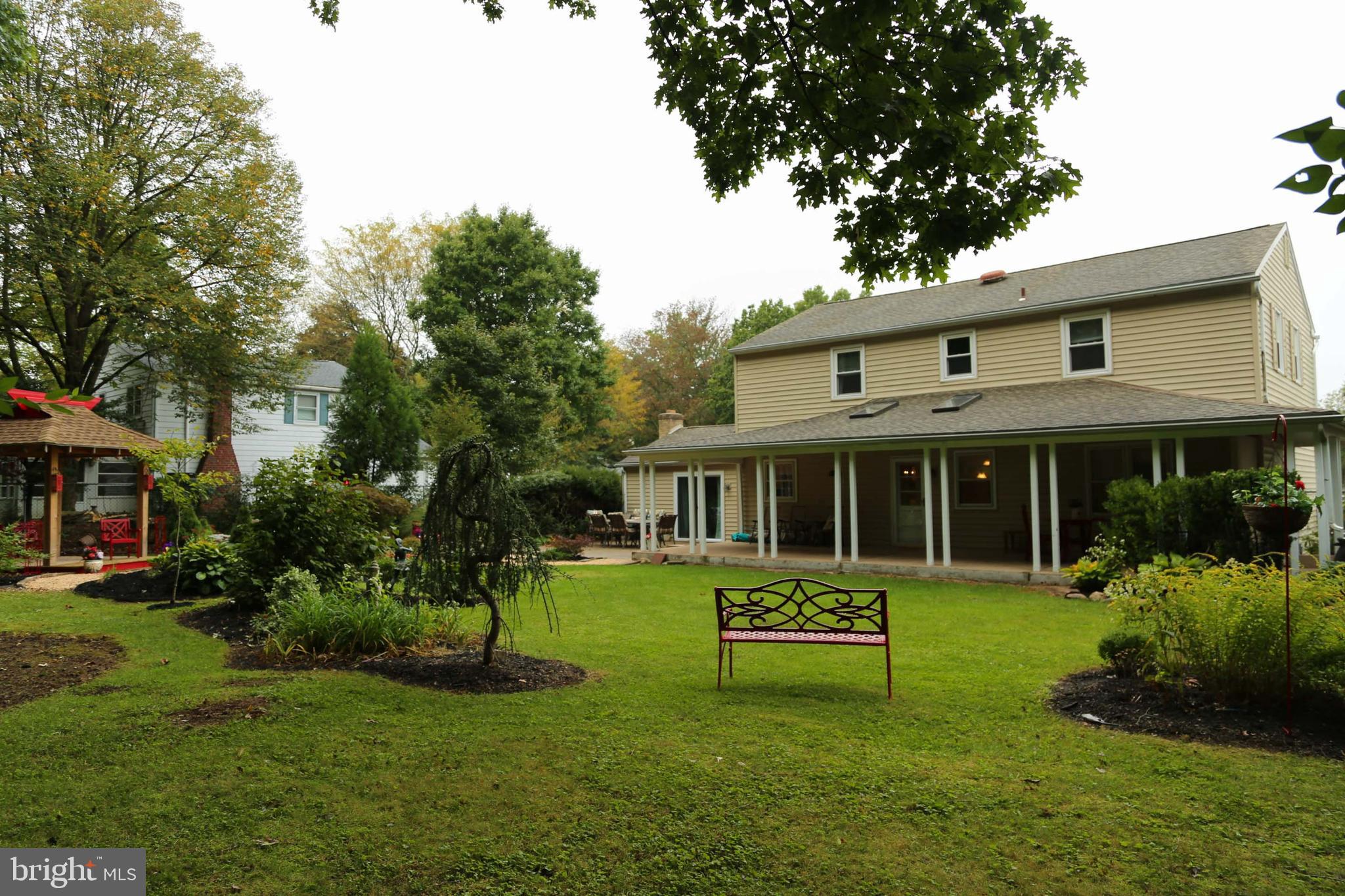 938 Anders Road Lansdale, PA 19446 - Photo 2 of 27 Back exterior- roof covers entire length of patio