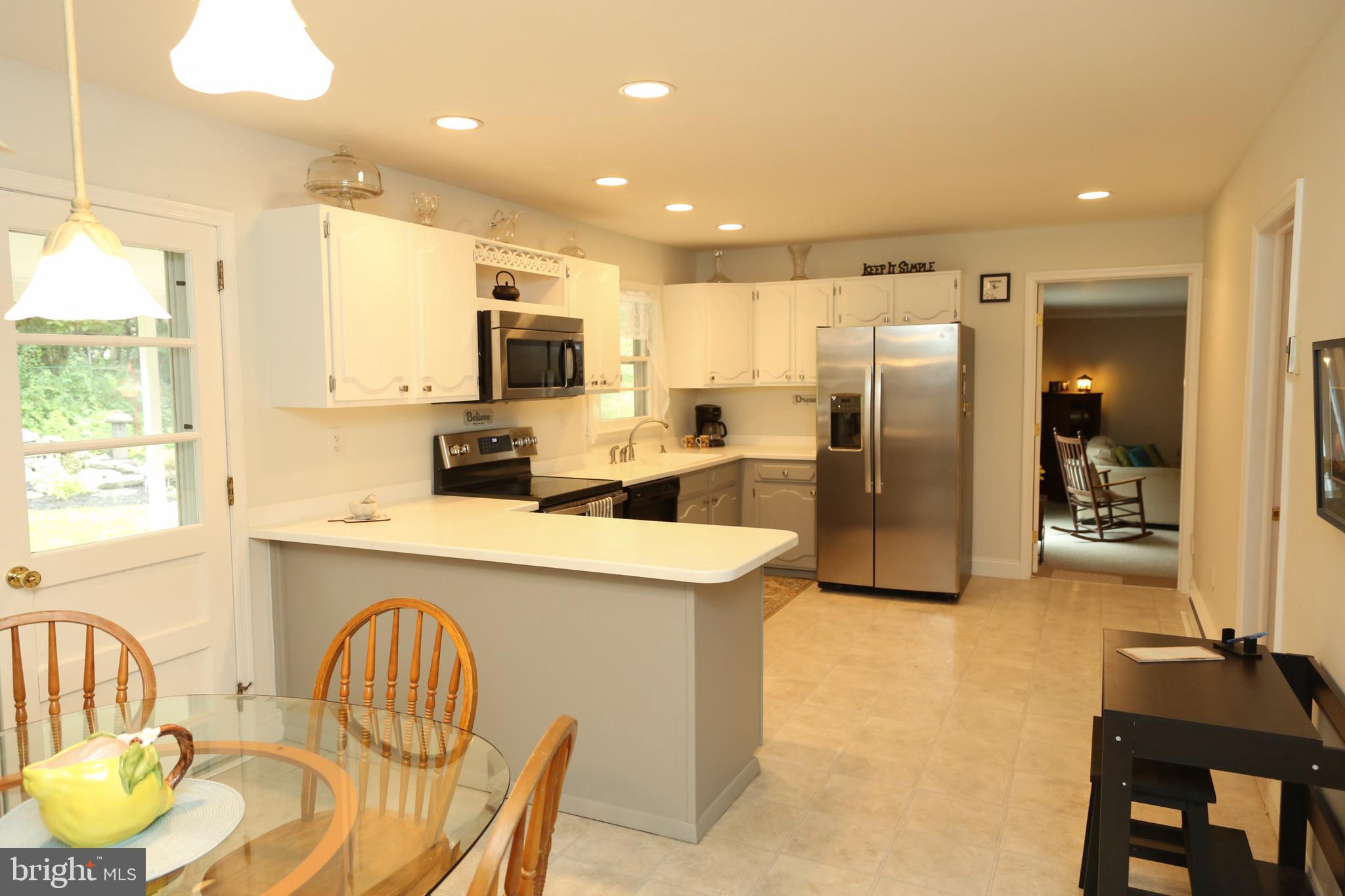 938 Anders Road Lansdale, PA 19446 - Photo 8 of 27 Open floor plan in kitchen and outside access