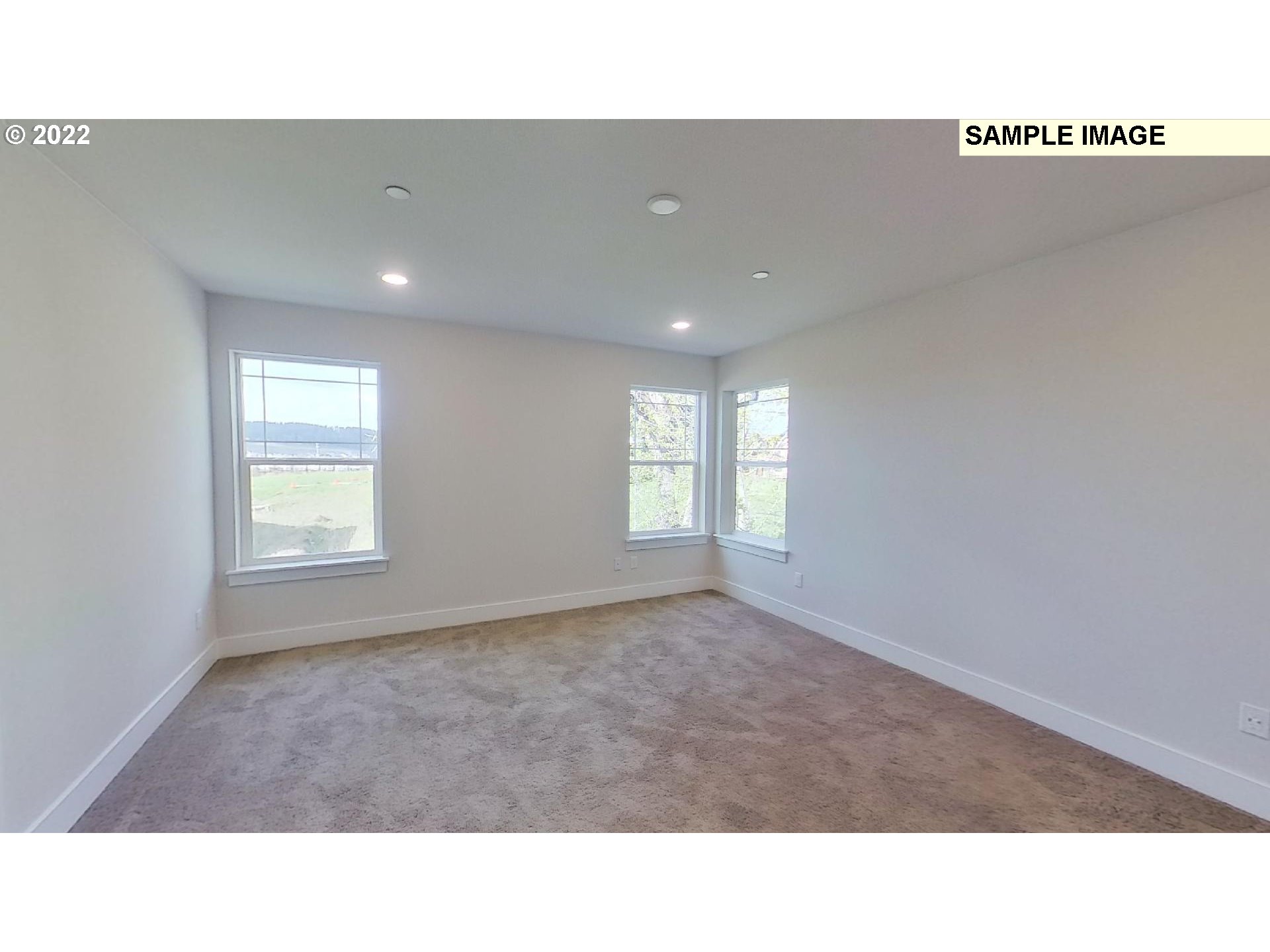 12814 Strobel Road Beaverton, OR 97007 - Photo 12 of 23 a open hall with a window and a projector