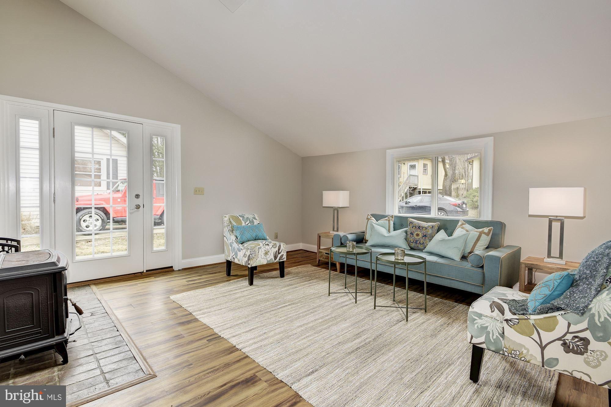 401 Paradise Road Riva, MD 21140 - Photo 3 of 17 Spacious Living room with wood stove
