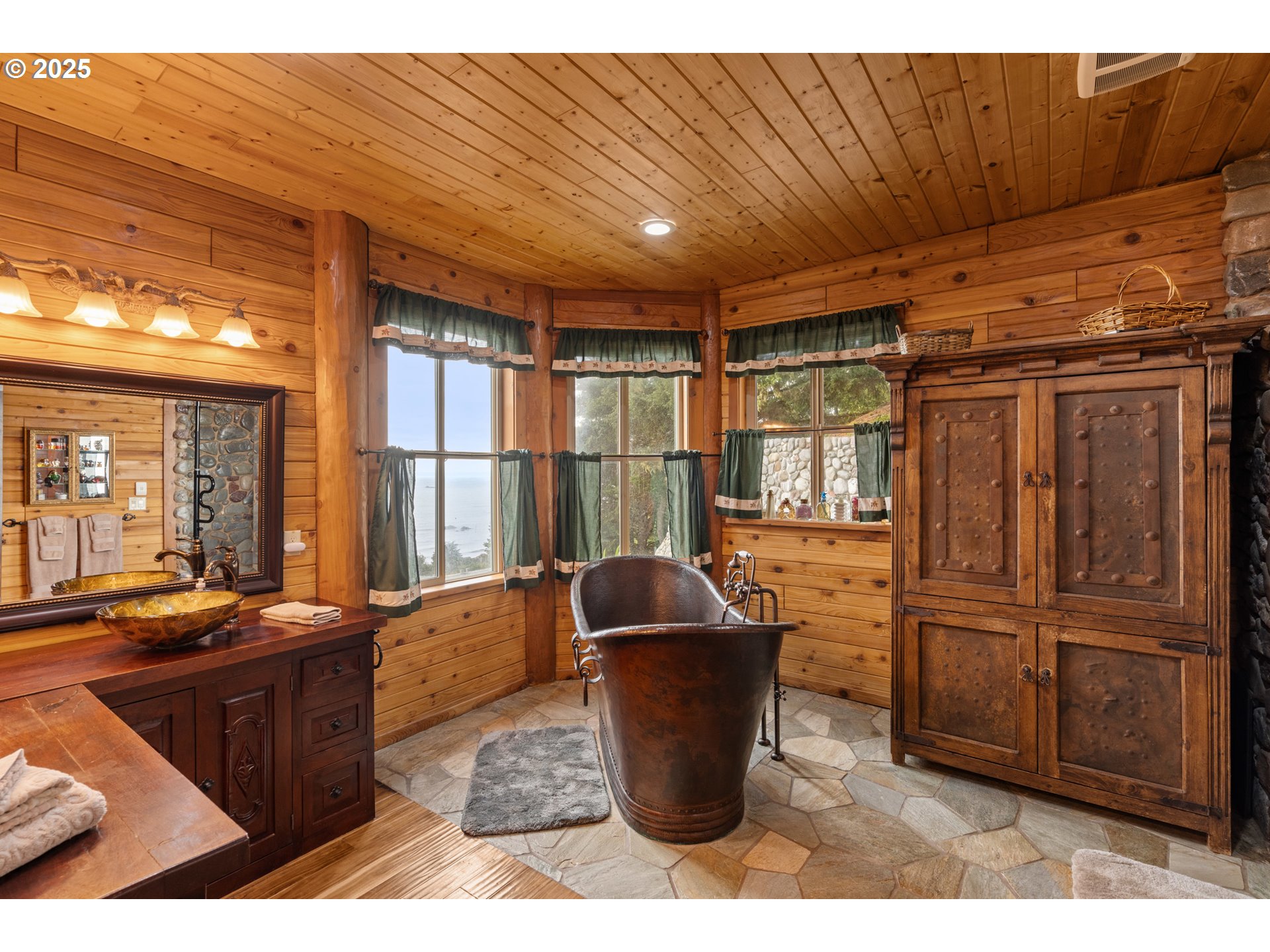 35400 Highway 101 Gold Beach, OR 97444 - Photo 17 of 46 a room with granite countertop lots of wooden furniture