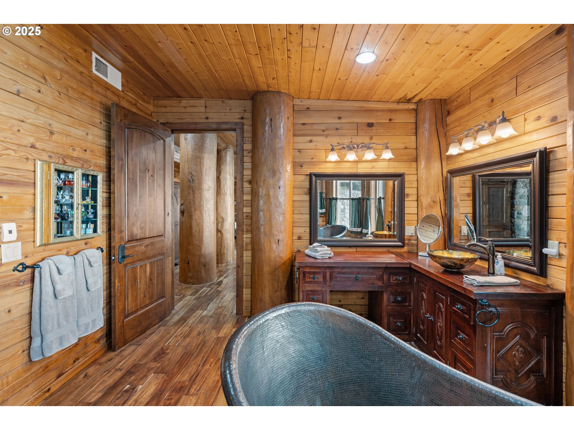 35400 Highway 101 Gold Beach, OR 97444 - Photo 18 of 46 a kitchen with a sink and wooden cabinets