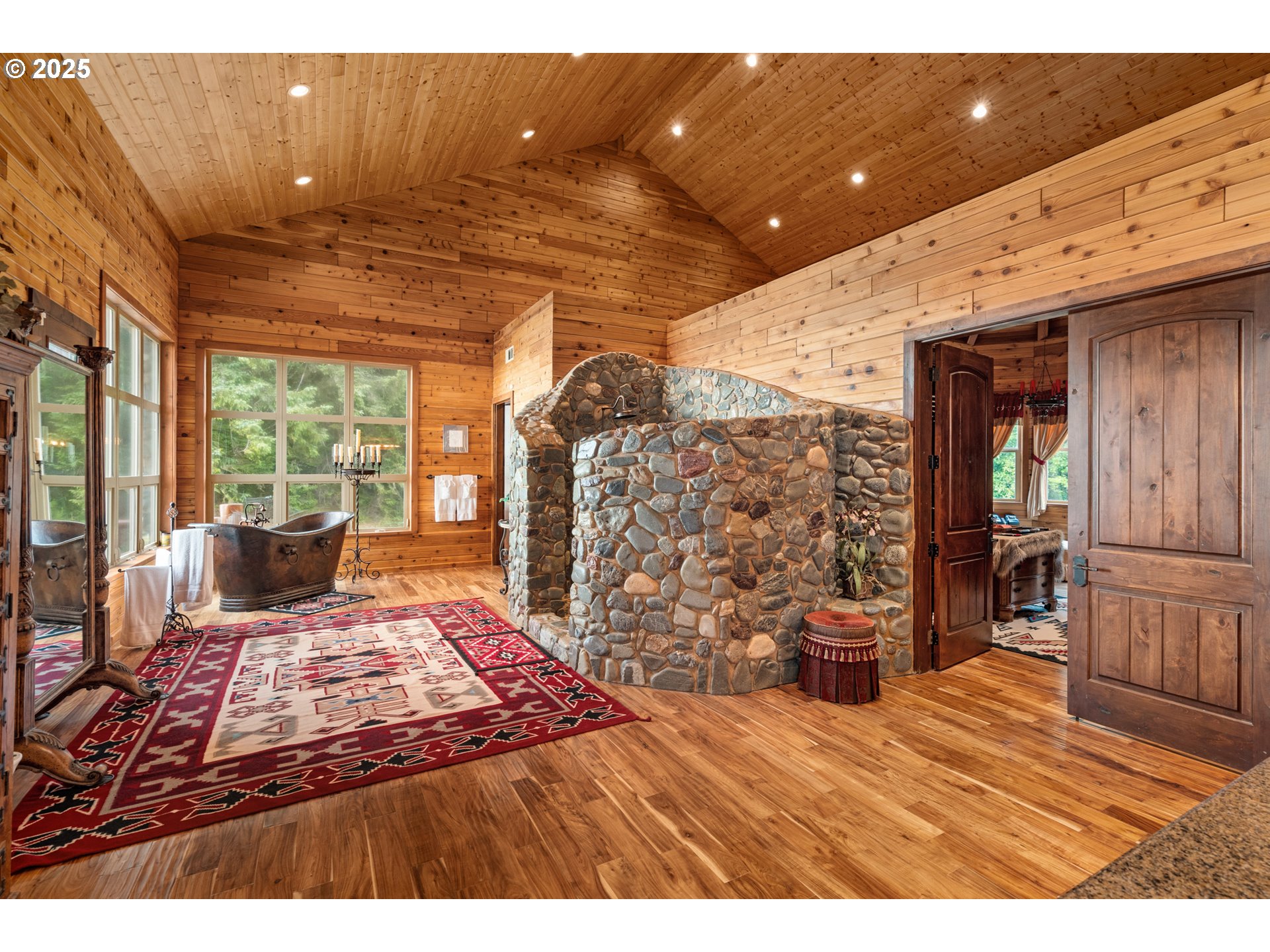 35400 Highway 101 Gold Beach, OR 97444 - Photo 28 of 46 a living room with furniture and a fireplace