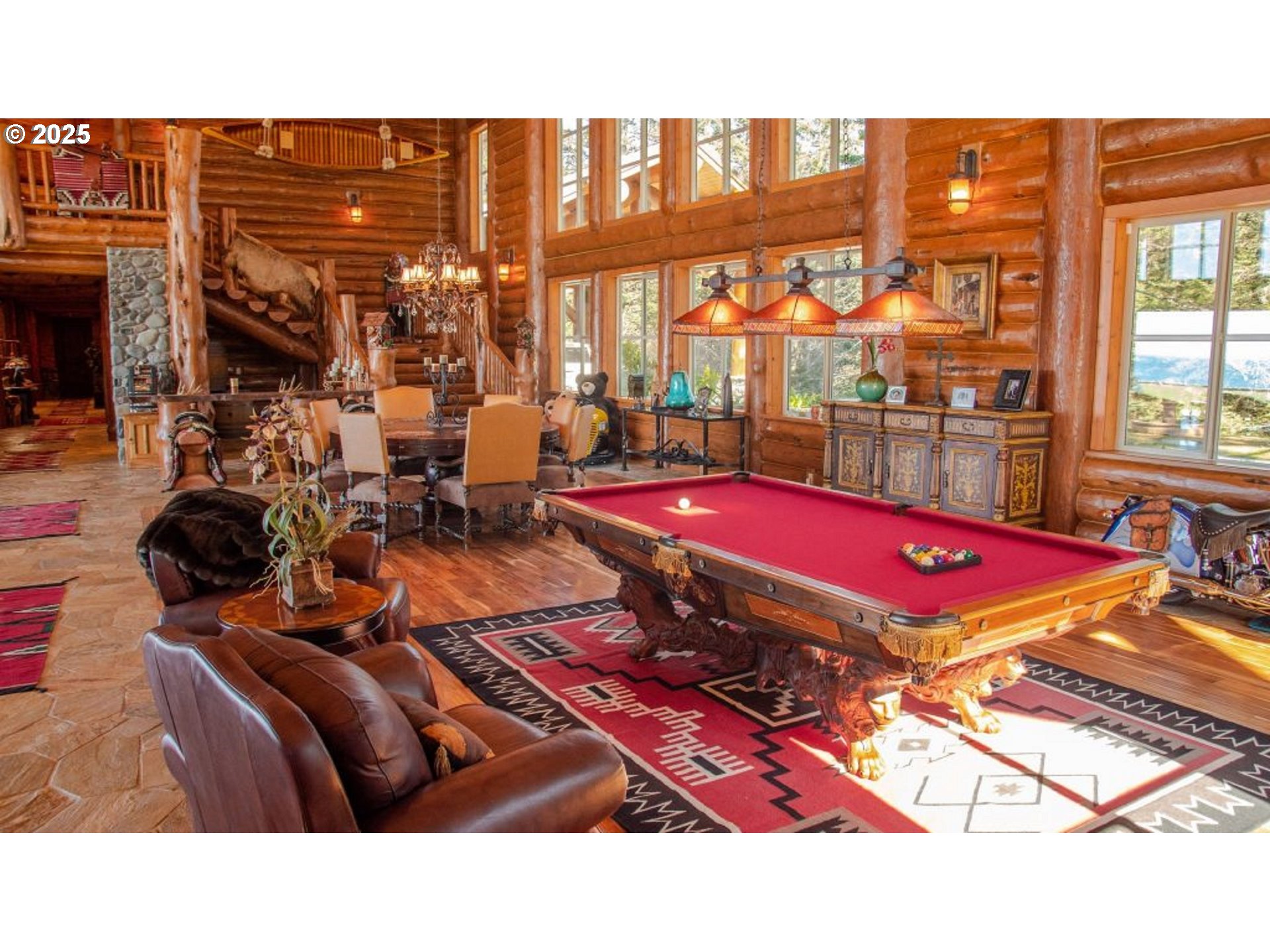 35400 Highway 101 Gold Beach, OR 97444 - Photo 3 of 46 a room with gym equipment and a floor to ceiling window