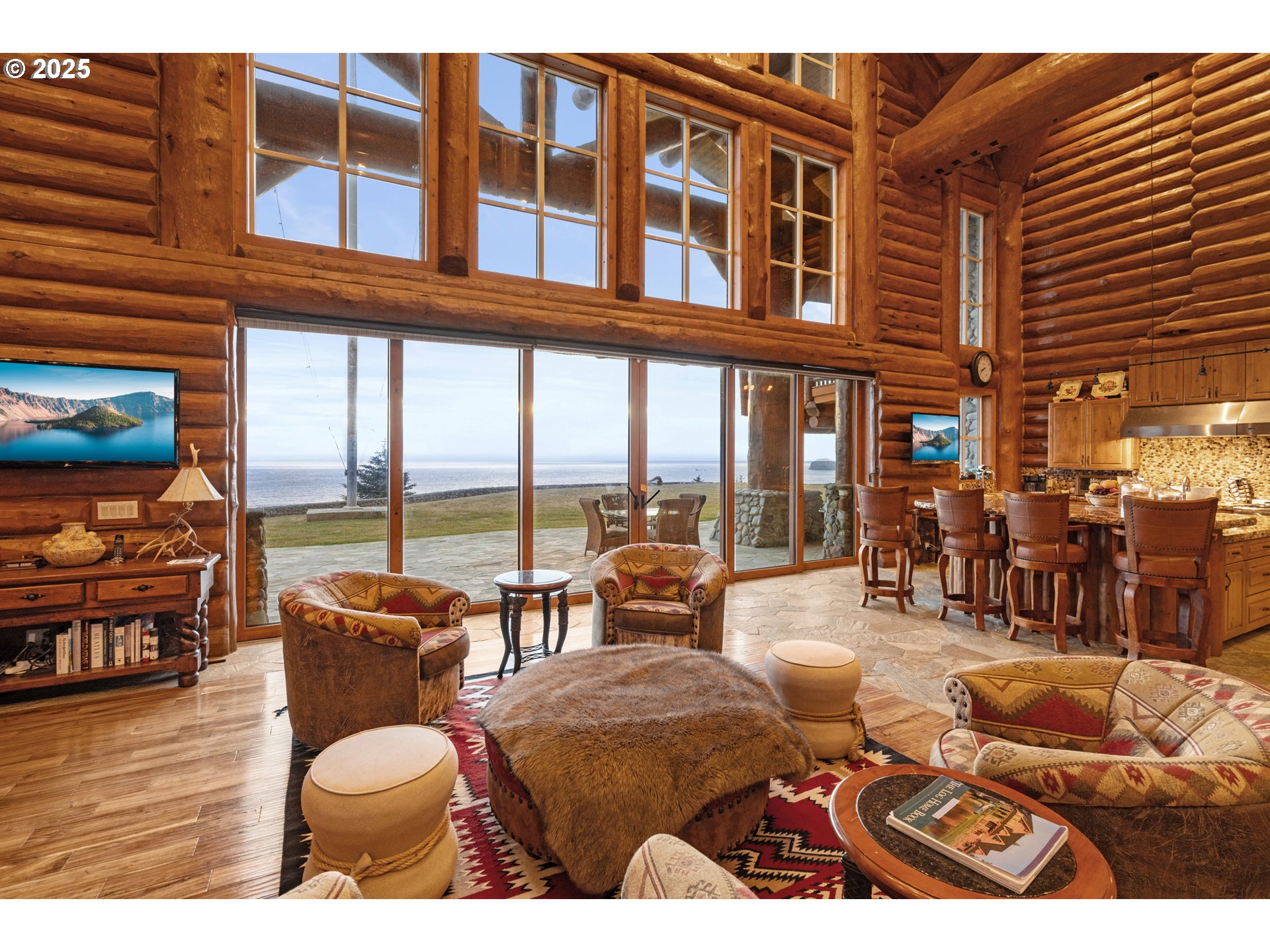 35400 Highway 101 Gold Beach, OR 97444 - Photo 6 of 46 a balcony filled with furniture and wooden floor