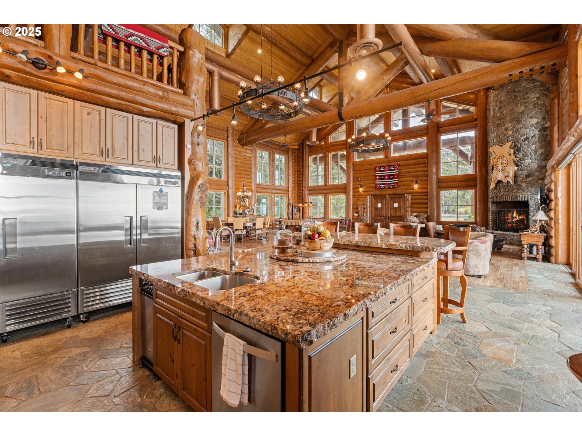 35400 Highway 101 Gold Beach, OR 97444 - Photo 8 of 46 a kitchen with a sink and a refrigerator