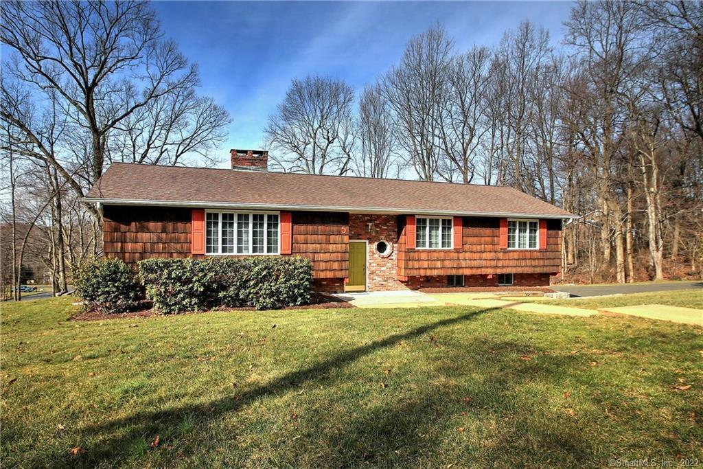 5 Split Rock Road Trumbull, CT 06611 - Photo 1 of 1 a front view of a house with a yard