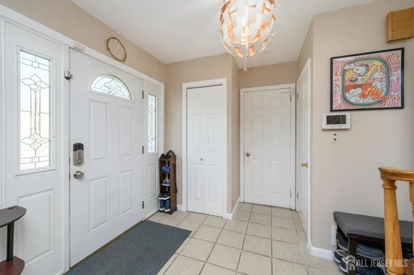 a view of a hallway with front door