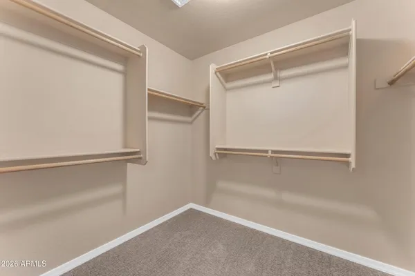 a view of an empty walk in closet