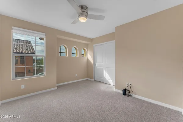 an empty room with windows