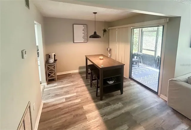 a spacious bathroom with a double vanity sink and a window
