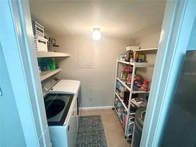 a storage room with a washer and dryer