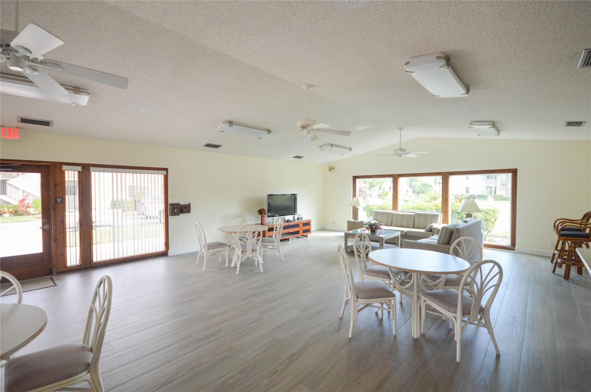 3151 Southeast Aster Lane, Unit 1301 Stuart, FL 34994 - Photo 24 of 30 a view of a dining room with furniture window and outside view