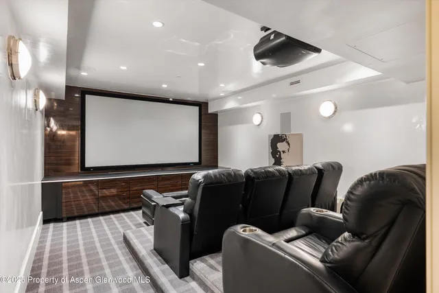 a living room with a table and gym equipment