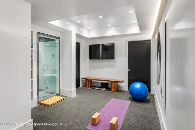 swimming pool view with a seating space