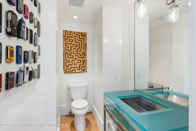 front view of a building with a garden