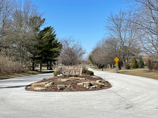 a view of a playground with basketball court