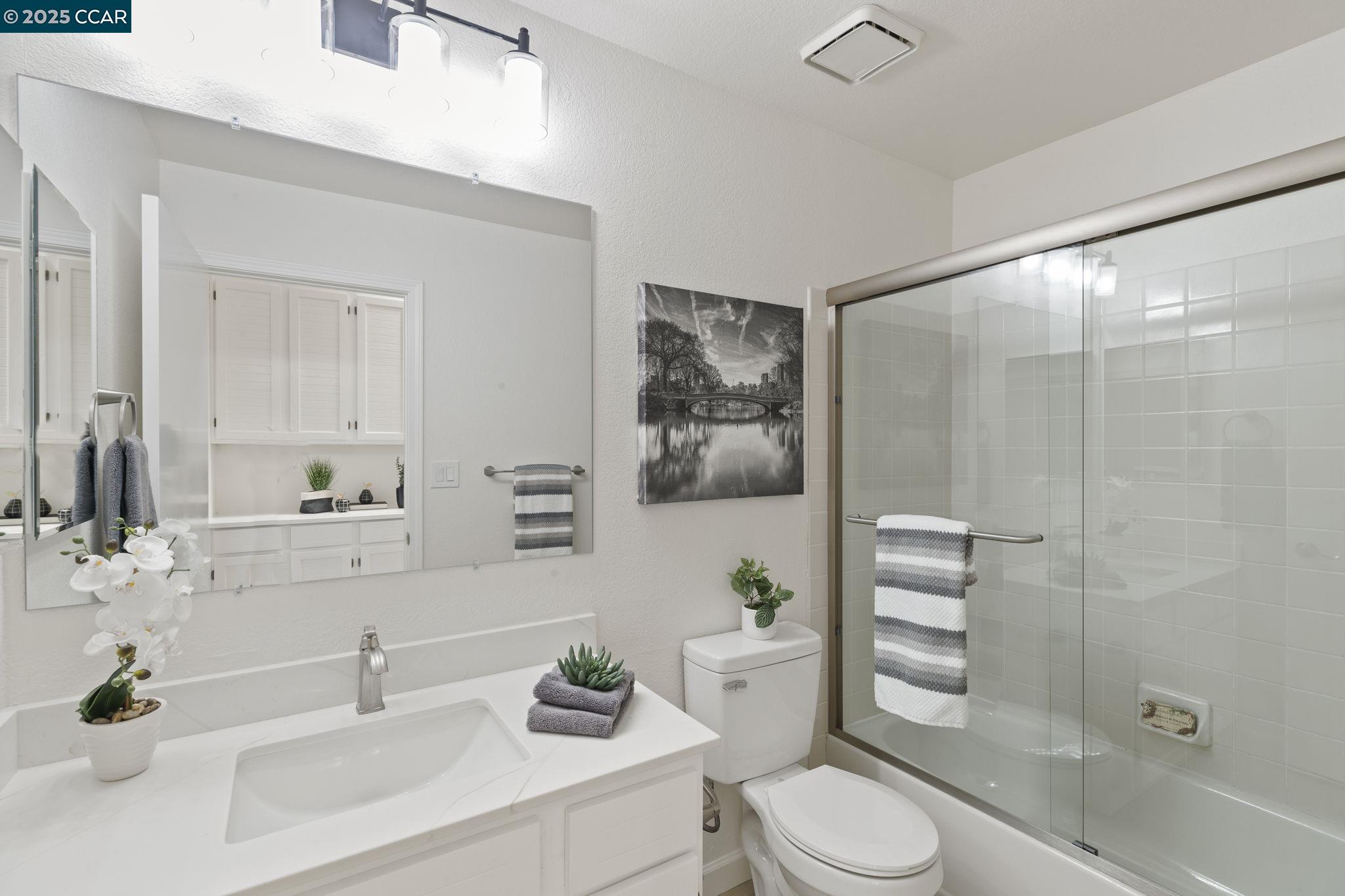 731 Lakemont Place, Unit 7 San Ramon, CA 94582 - Photo 30 of 55 a bathroom with a sink toilet and shower