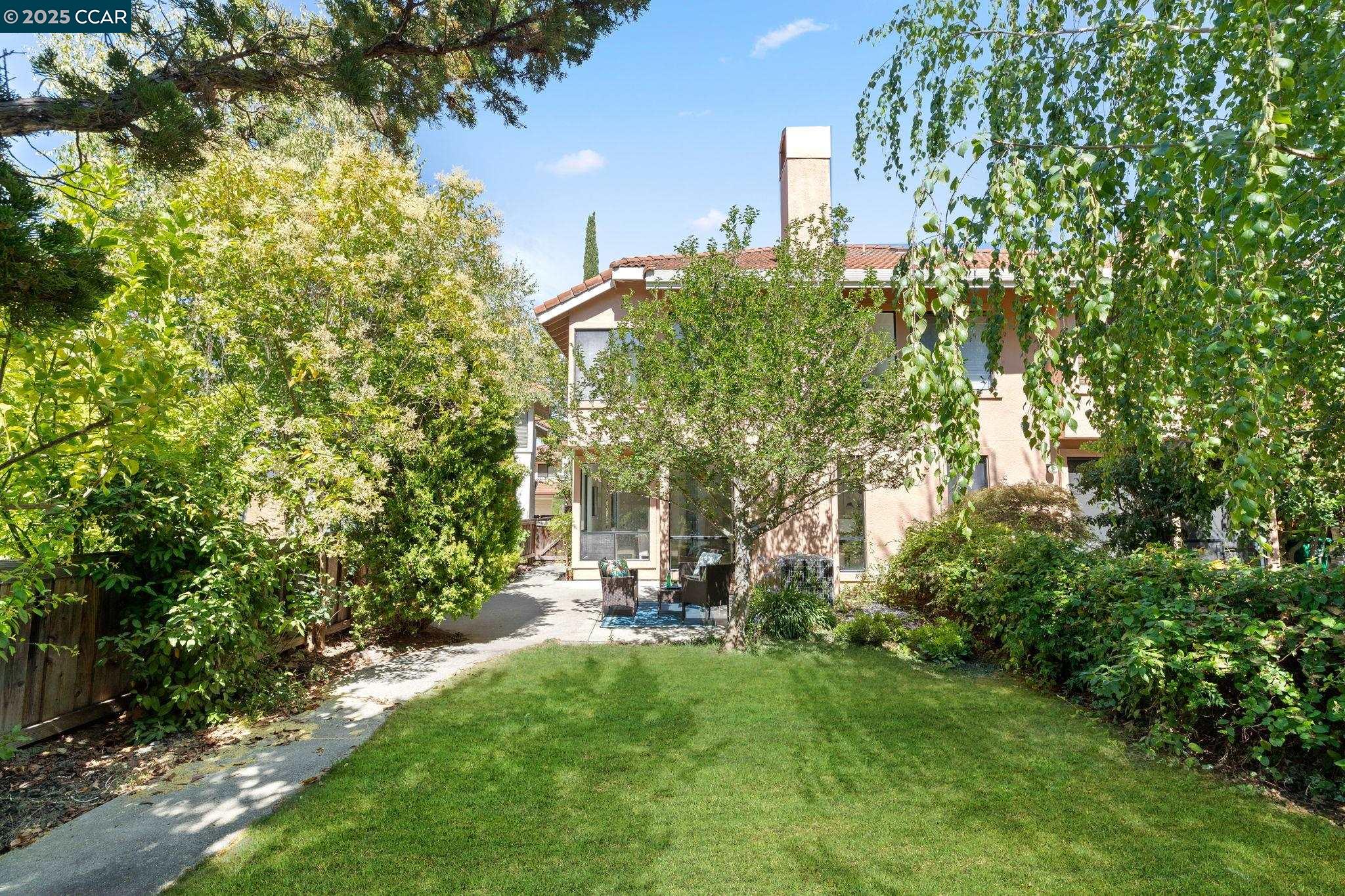 731 Lakemont Place, Unit 7 San Ramon, CA 94582 - Photo 3 of 55 a view of yard with green space and trees around