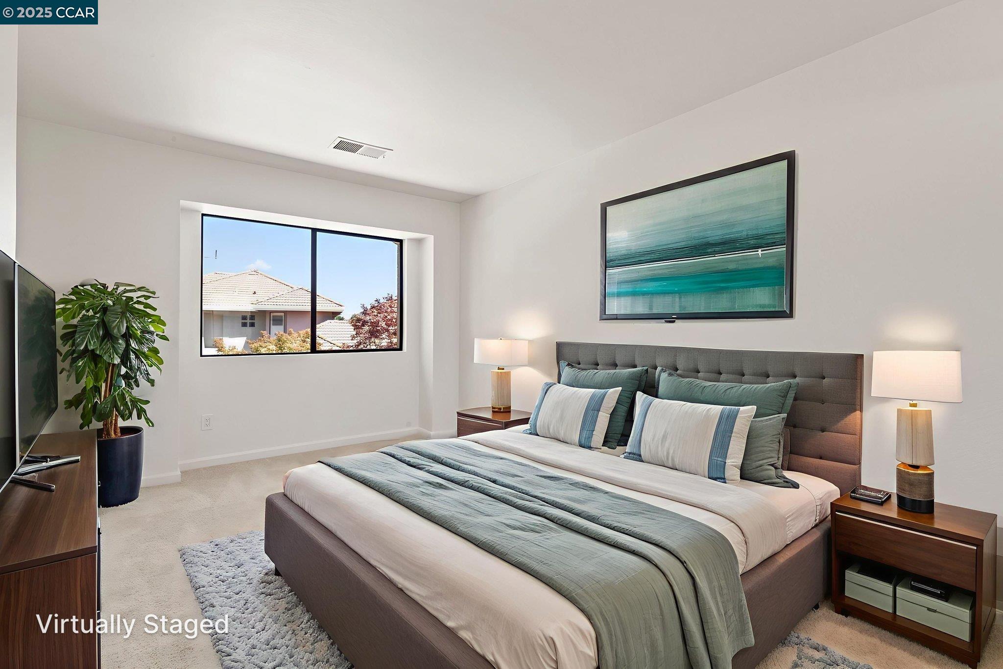 731 Lakemont Place, Unit 7 San Ramon, CA 94582 - Photo 33 of 55 a bedroom with bed painting on the wall and a potted plant