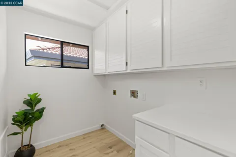 a bathroom with a sink toilet and mirror