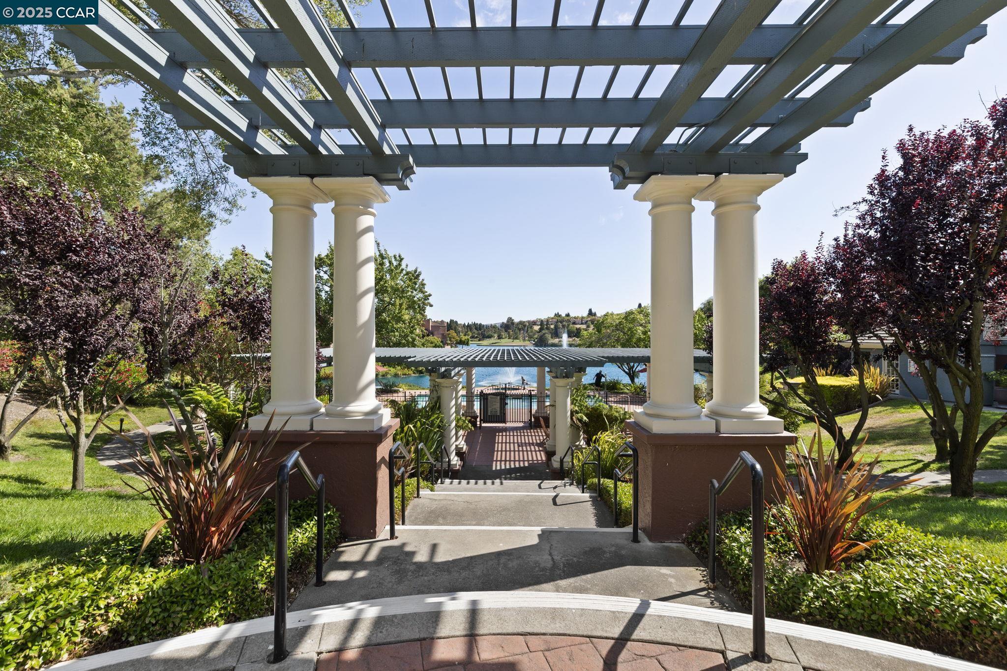 731 Lakemont Place, Unit 7 San Ramon, CA 94582 - Photo 51 of 55 a view of a patio with table and chairs and potted plants