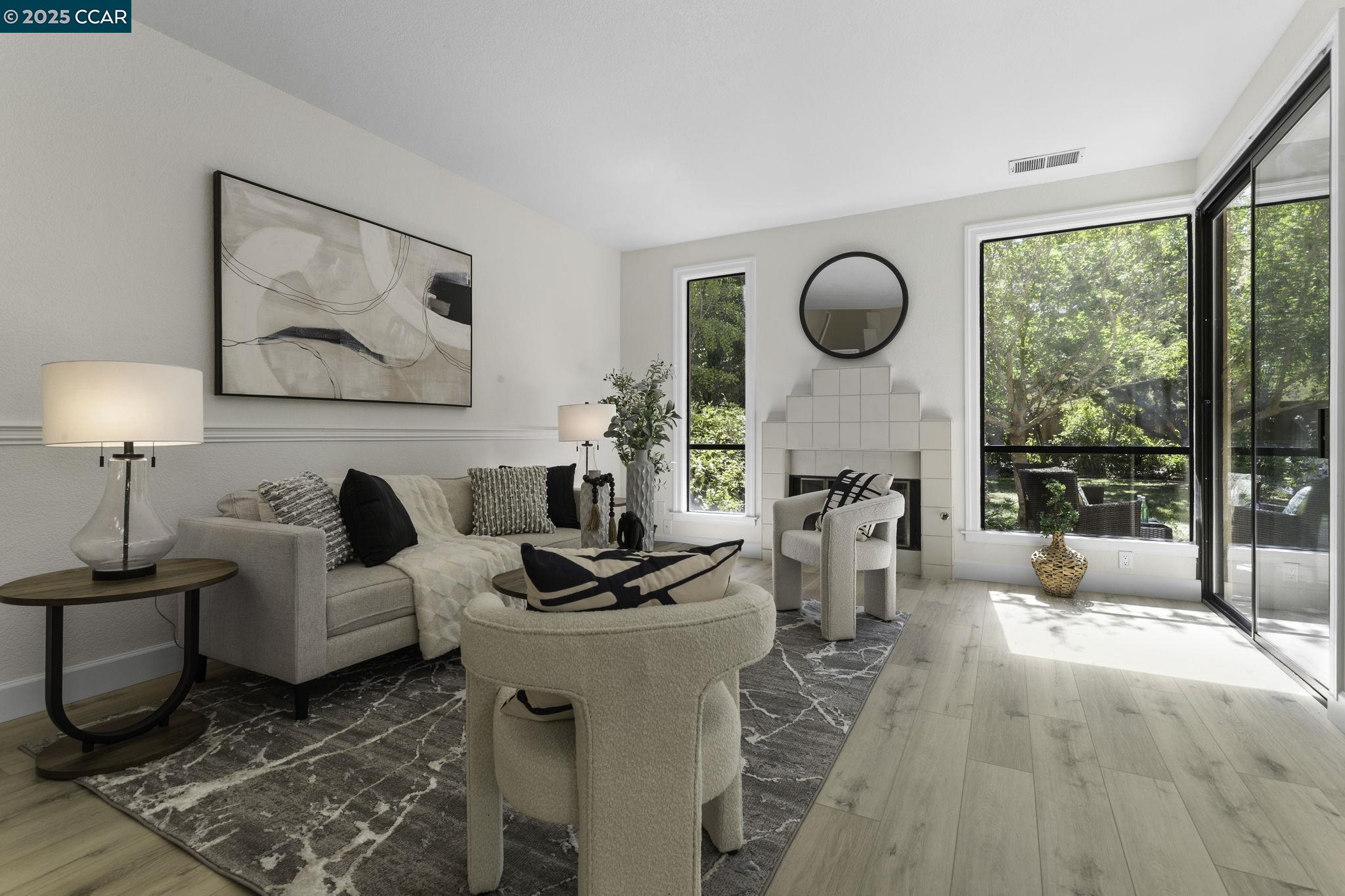 731 Lakemont Place, Unit 7 San Ramon, CA 94582 - Photo 7 of 55 a living room with furniture and a large window