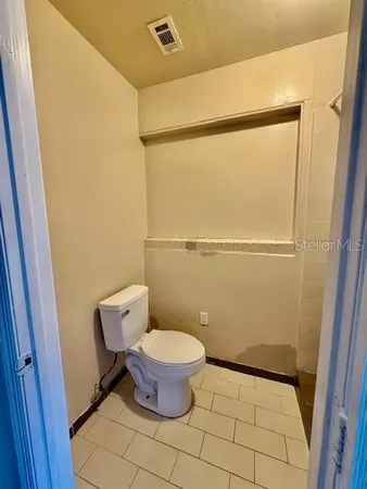 a bathroom with a toilet