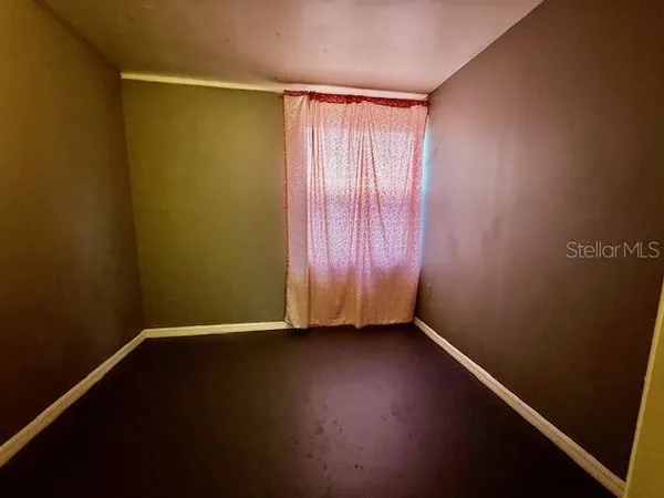 an empty room with a door