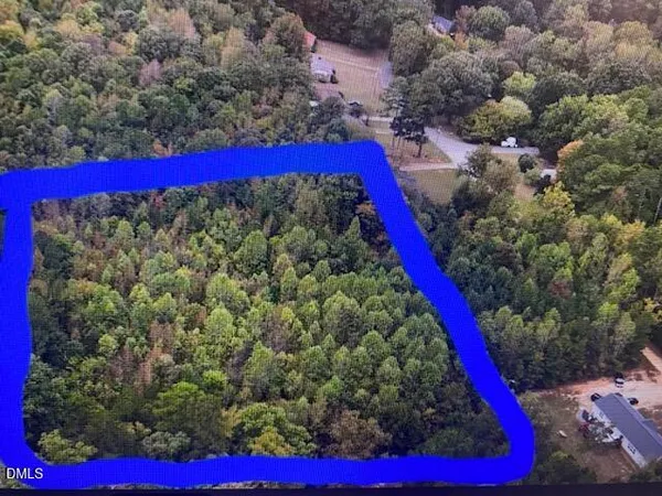 a view of a yard with a pool