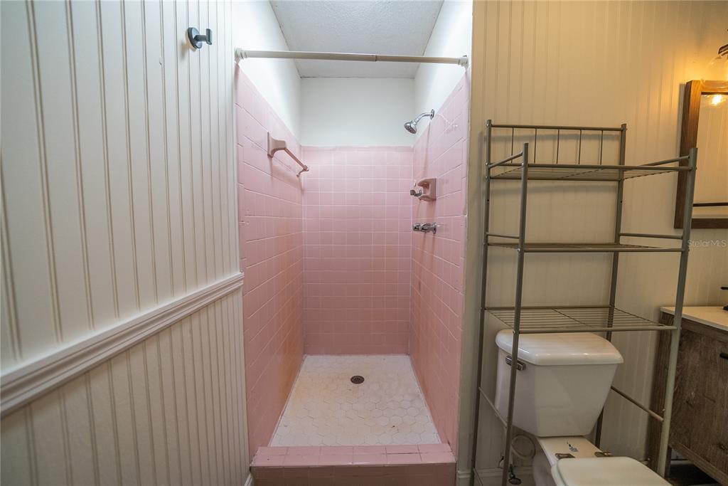 1740 Southeast 164th Circle Ocklawaha, FL 32179 - Photo 23 of 48 a bathroom with a toilet and a shower