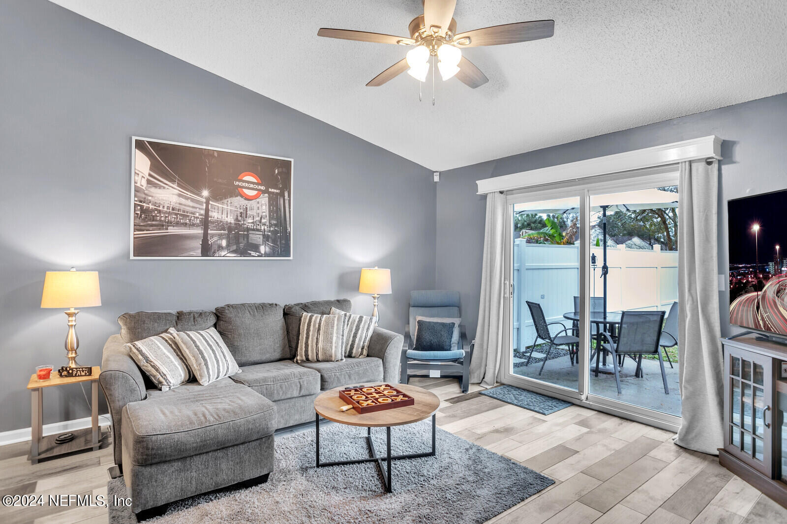 2476 Spring Vale Road Jacksonville, FL 32246 - Photo 9 of 16 a living room with furniture and a window